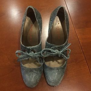 Anthropologie blue tie shoes featured on cover.
